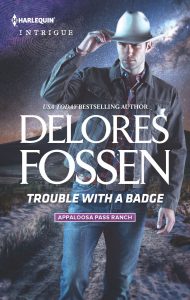 August 1_Trouble With A Badge_Delores Fossen